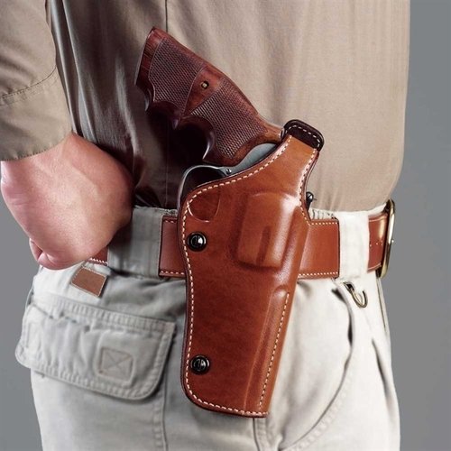 Das Dual Position Phoenix Holster aus hochwertigem Leder bietet starken Halt und schnelle Zugriffsoptionen, egal ob Strongside oder Crossdraw.